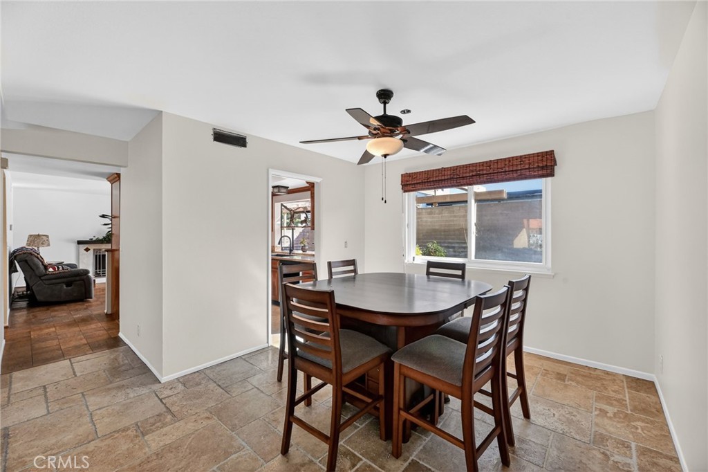 6116 East Paseo Rio Azul Anaheim, CA 92807 - Photo 18 of 54 a view of a dining room and livingroom with furniture