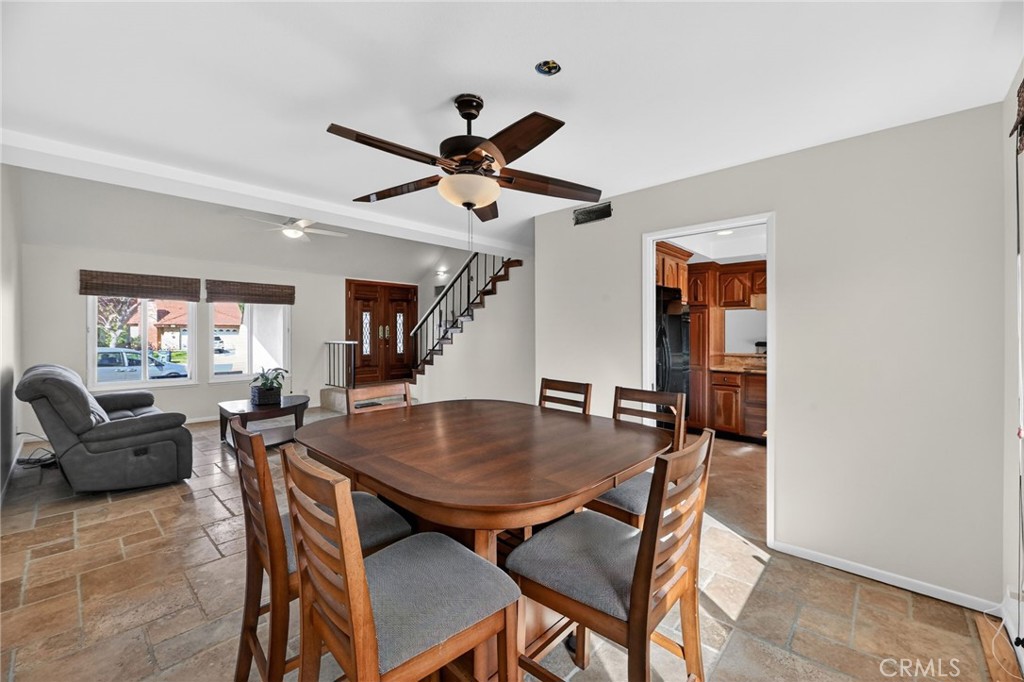 6116 East Paseo Rio Azul Anaheim, CA 92807 - Photo 19 of 54 a dining room with furniture and window