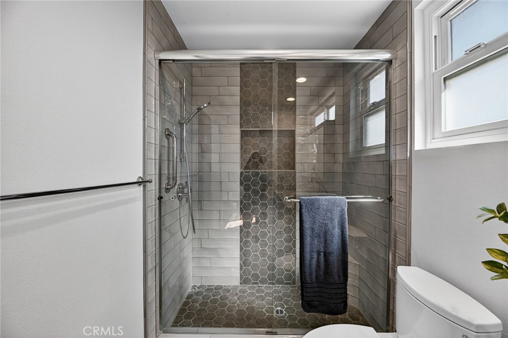 6116 East Paseo Rio Azul Anaheim, CA 92807 - Photo 33 of 54 a bathroom with a shower and a toilet