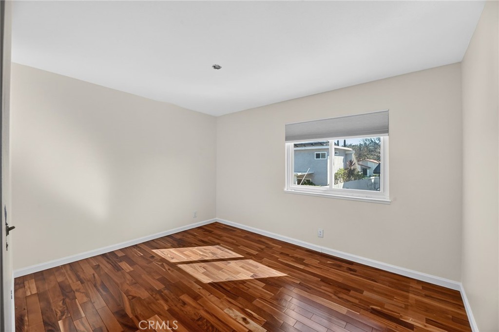6116 East Paseo Rio Azul Anaheim, CA 92807 - Photo 35 of 54 a view of a room with wooden floor and closet