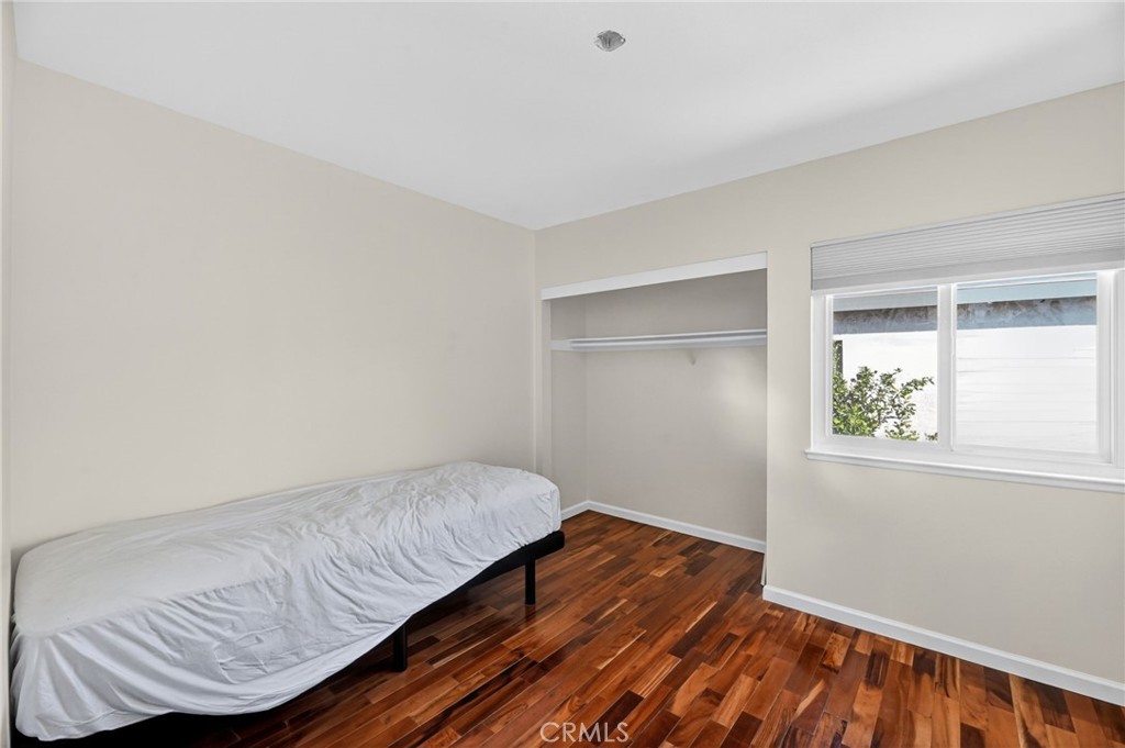 6116 East Paseo Rio Azul Anaheim, CA 92807 - Photo 37 of 54 a room with a bed and a window