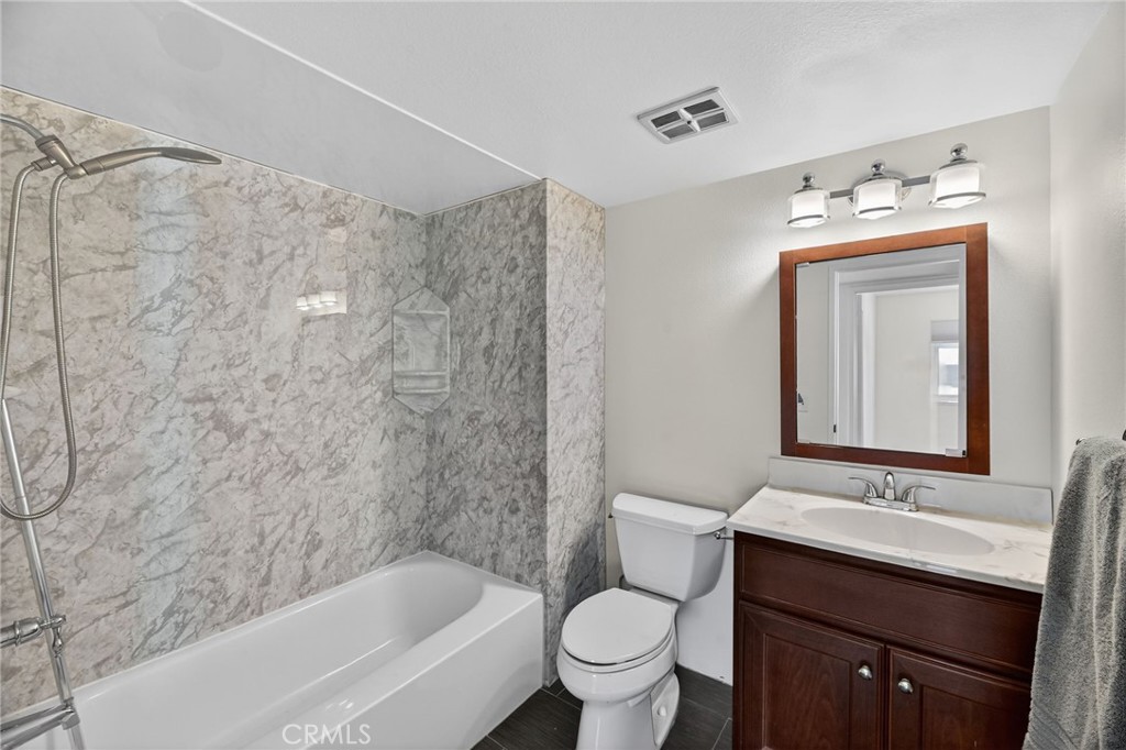6116 East Paseo Rio Azul Anaheim, CA 92807 - Photo 10 of 54 a bathroom with a sink toilet and shower