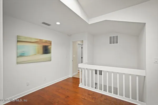 a view of a hallway with entryway