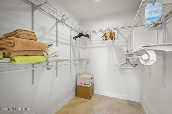 a bathroom with a shower and a shower