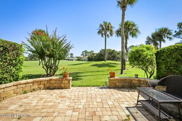 a view of a garden with a slide