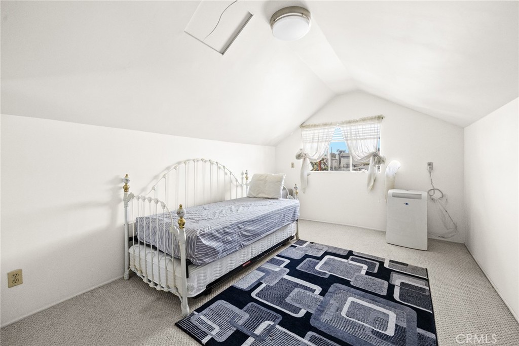 2003 Vine Street Alhambra, CA 91801 - Photo 34 of 43 a bedroom with furniture and a window