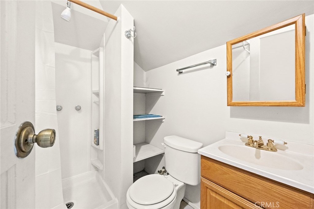 2003 Vine Street Alhambra, CA 91801 - Photo 35 of 43 a white toilet sitting next to a bathroom sink