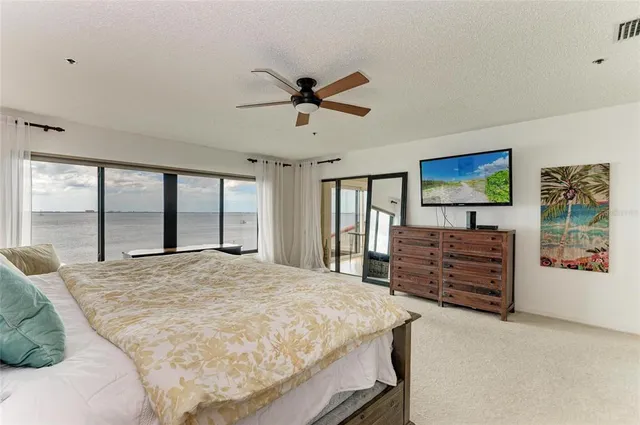 a bathroom with a tub and shower