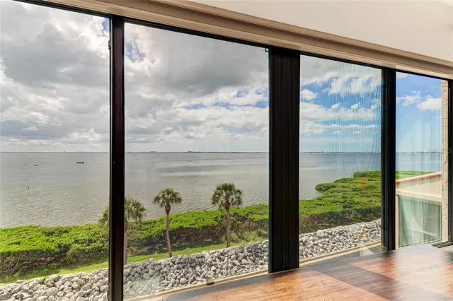 a view of walk in closet with clothes