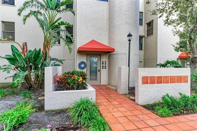 a front view of a house with yard