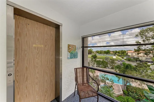 a view of a glass door with glass windows