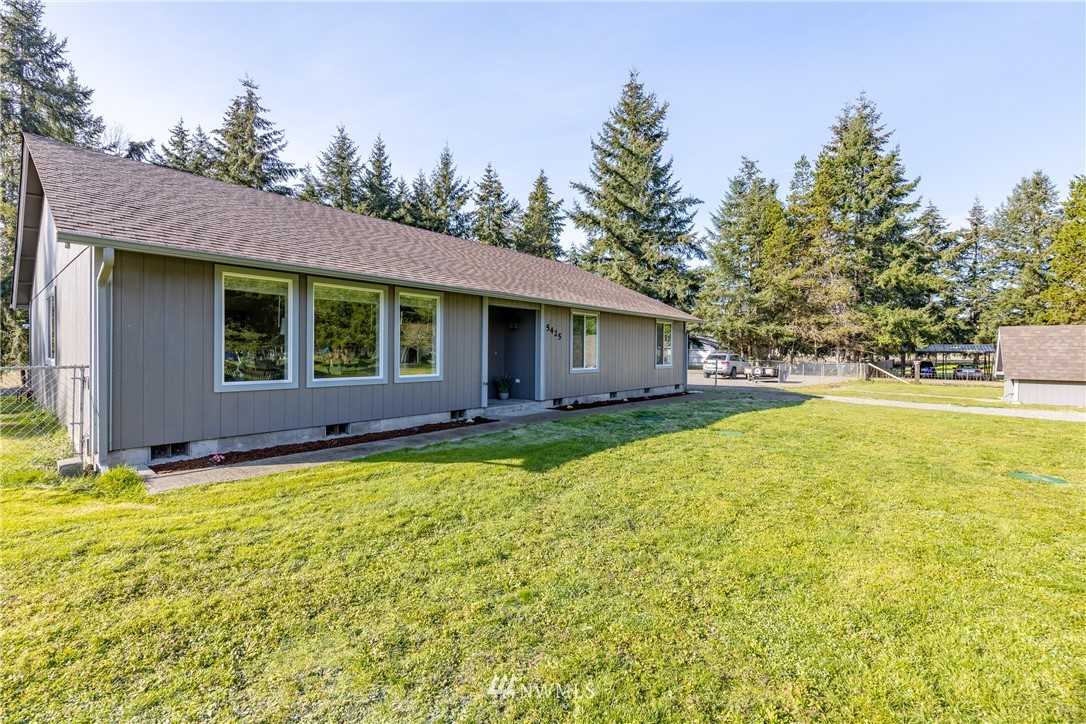 5425 188th Avenue Southwest Rochester, WA 98579 - Photo 3 of 40 a view of a house with swimming pool and a yard