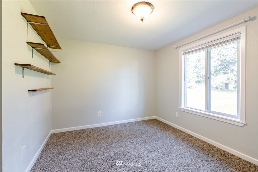 5425 188th Avenue Southwest Rochester, WA 98579 - Photo 25 of 40 an empty room with windows