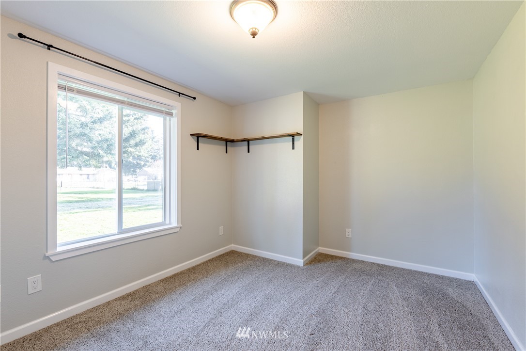 5425 188th Avenue Southwest Rochester, WA 98579 - Photo 26 of 40 a view of a room that has a window in it