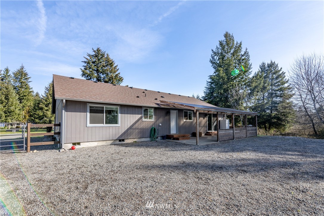 5425 188th Avenue Southwest Rochester, WA 98579 - Photo 30 of 40 a house view with a backyard space