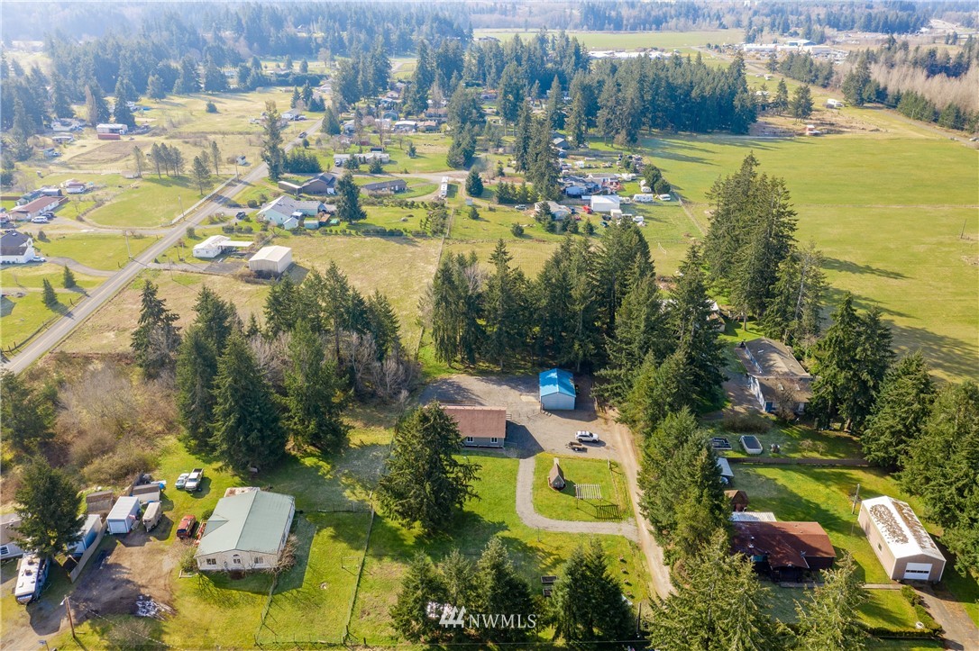 5425 188th Avenue Southwest Rochester, WA 98579 - Photo 34 of 40 an aerial view of residential houses with outdoor space