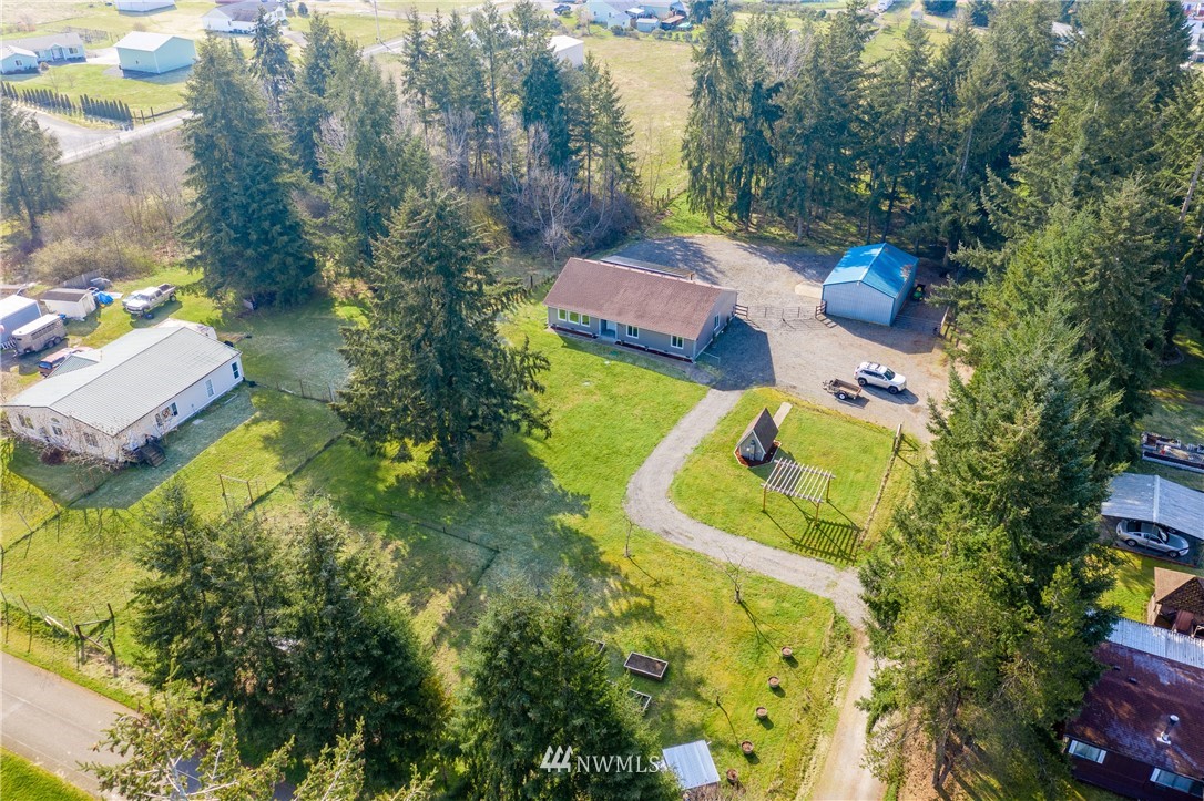 5425 188th Avenue Southwest Rochester, WA 98579 - Photo 35 of 40 an aerial view of a house with swimming pool and garden