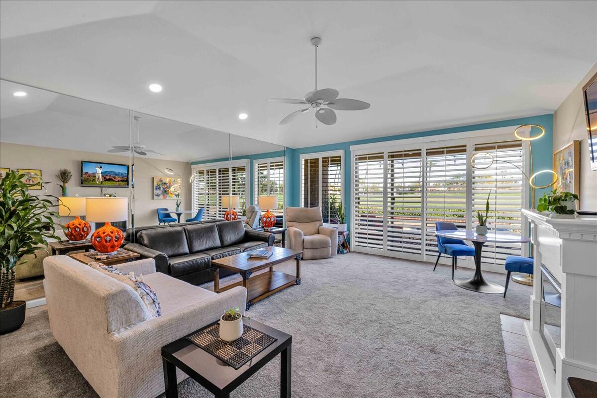 43 Sunrise Drive Rancho Mirage, CA 92270 - Photo 12 of 56 a living room with furniture and a large window
