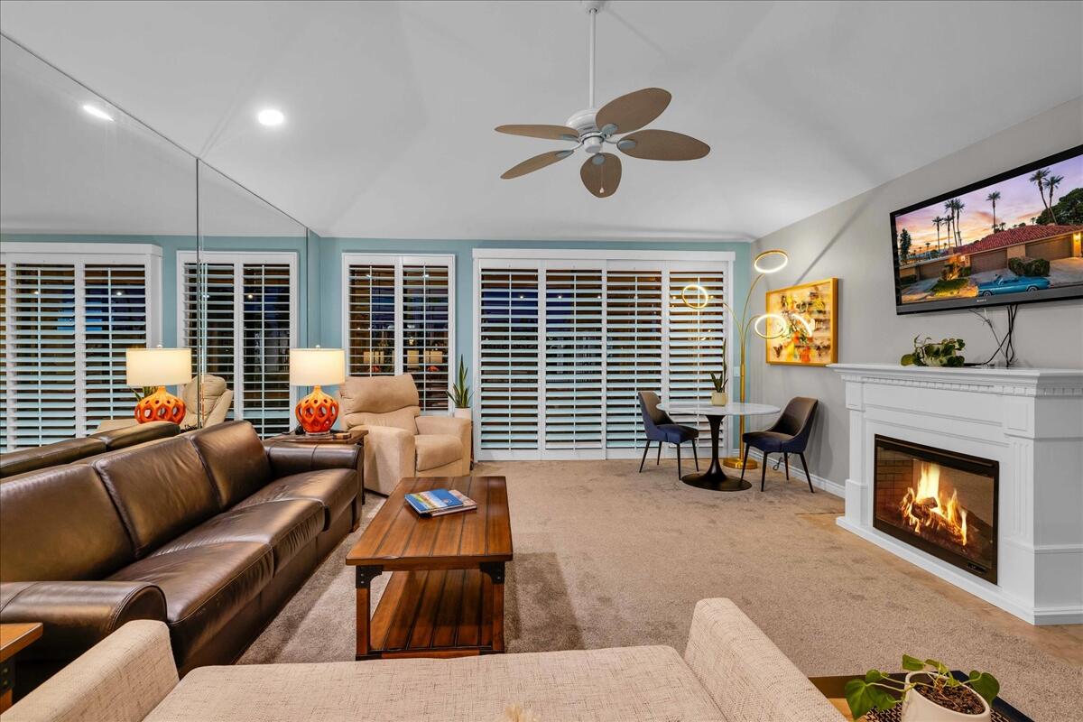 43 Sunrise Drive Rancho Mirage, CA 92270 - Photo 13 of 56 a living room with furniture a fireplace and window