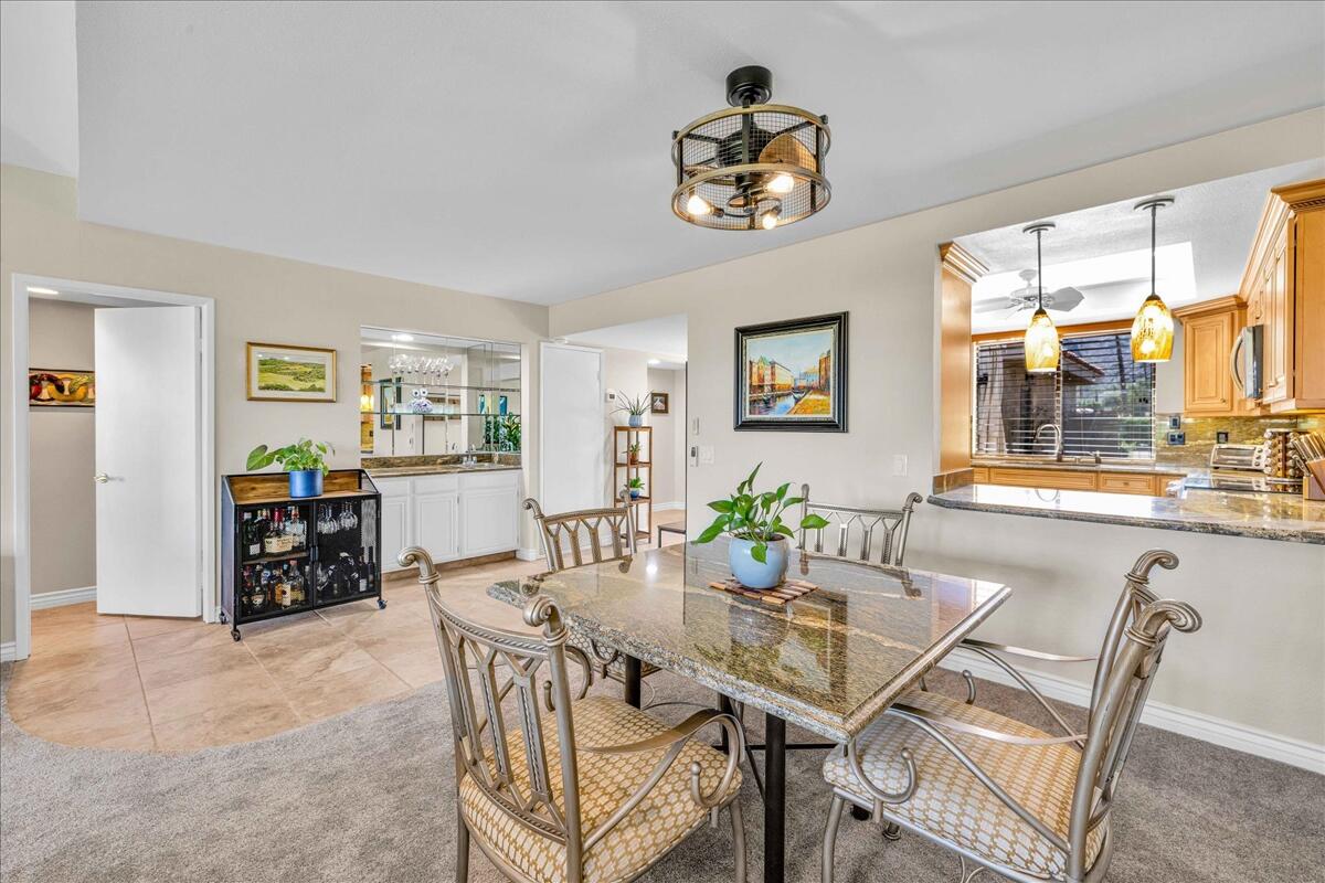 43 Sunrise Drive Rancho Mirage, CA 92270 - Photo 15 of 56 a dining room with furniture and window