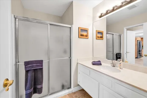 an aerial view of residential houses and outdoor space