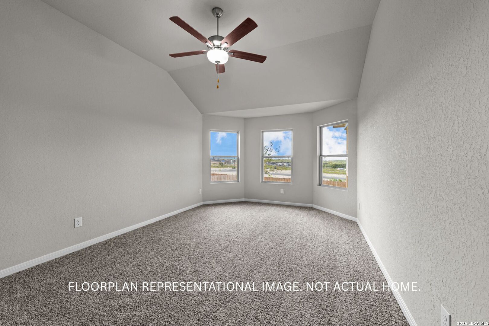 4810 Rio Ruidoso Von Ormy, TX 78073 - Photo 12 of 31 an empty room with windows and ceiling fan