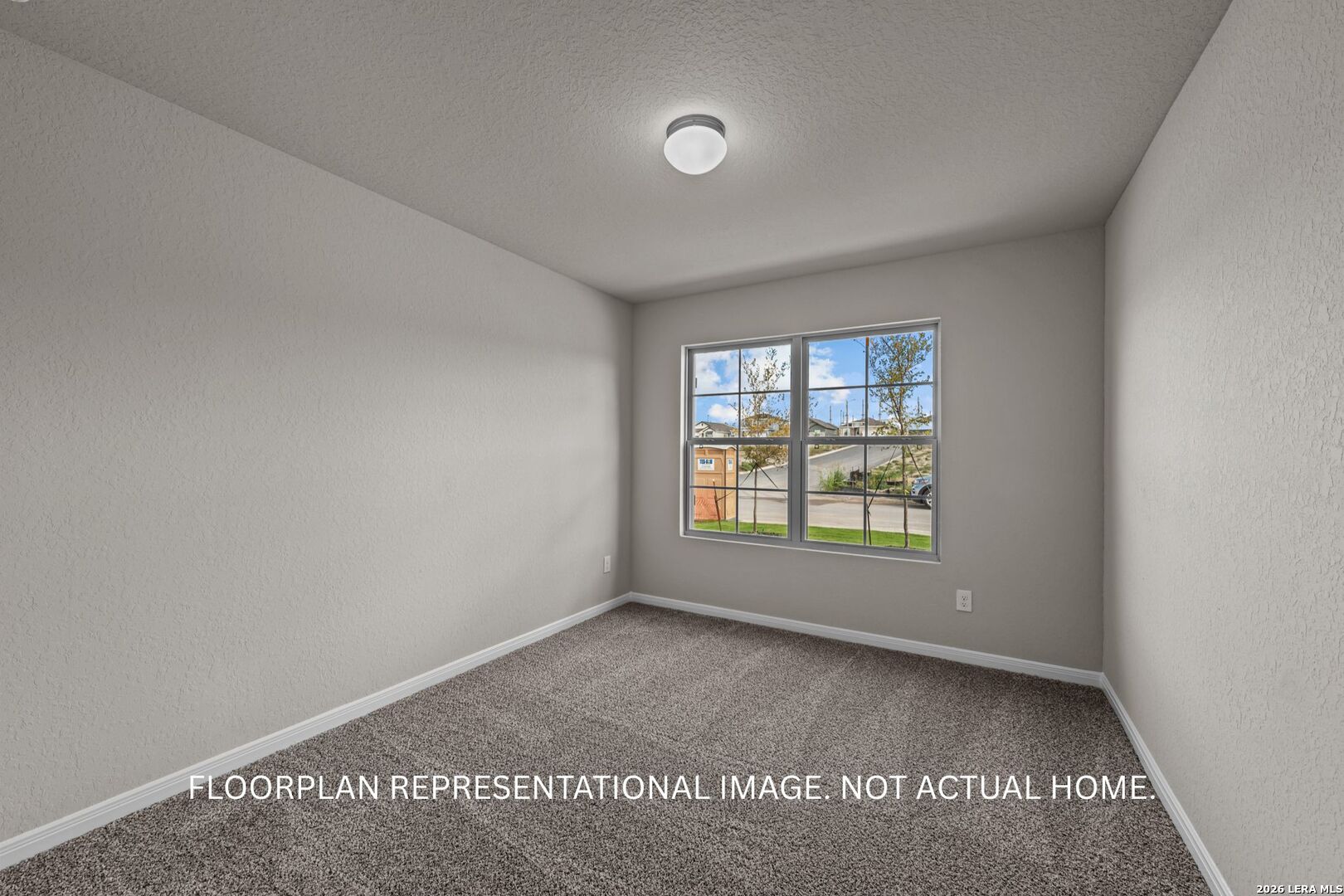 4810 Rio Ruidoso Von Ormy, TX 78073 - Photo 13 of 31 a view of a room that has a window in it