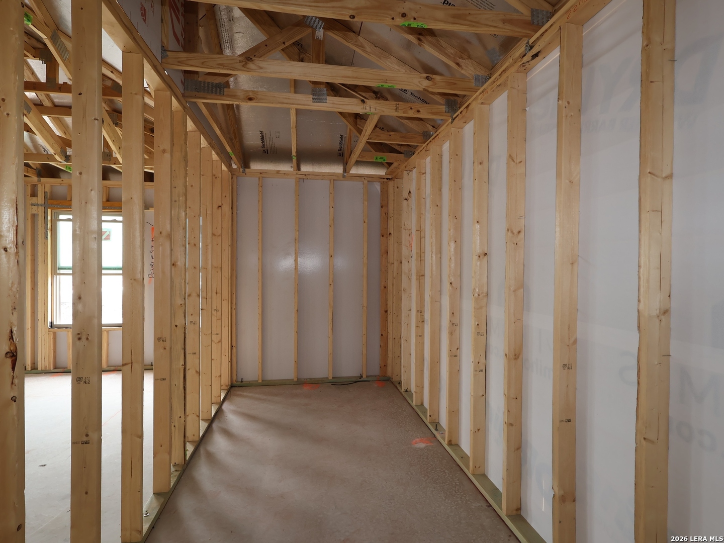 4810 Rio Ruidoso Von Ormy, TX 78073 - Photo 26 of 31 a view of hallway with wooden door