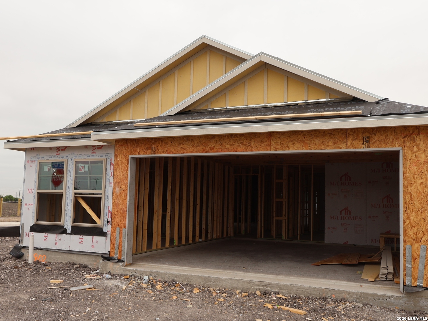 4810 Rio Ruidoso Von Ormy, TX 78073 - Photo 31 of 31 a front view of a house with a wooden fence