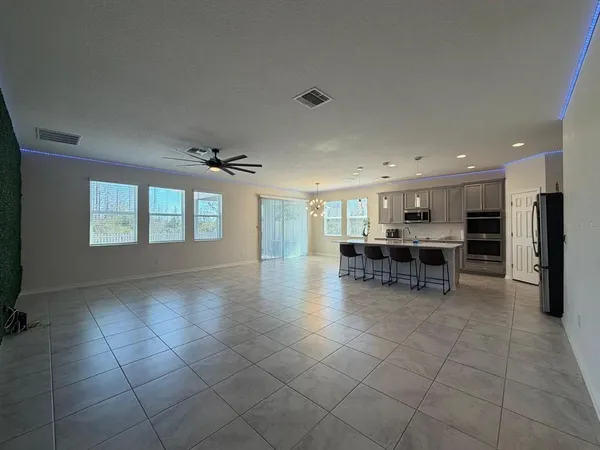 a view of kitchen with furniture and window