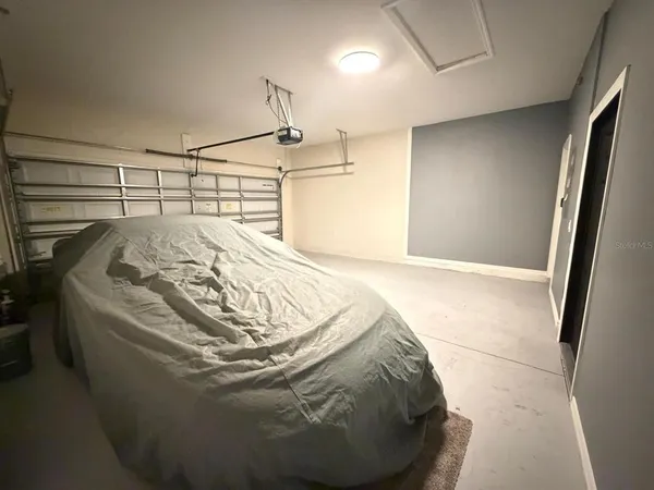 a view of a living room with furniture