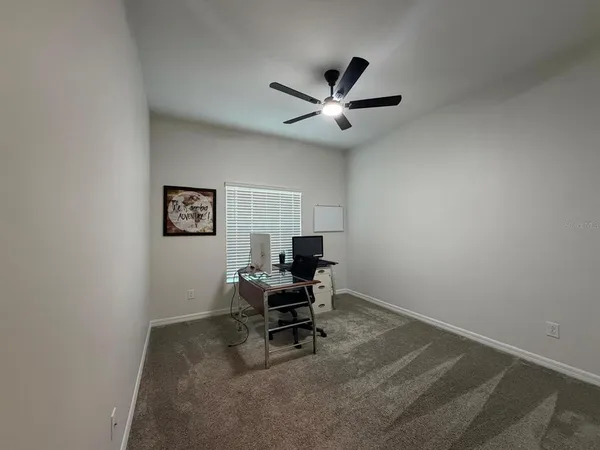 a workspace with a bookshelf