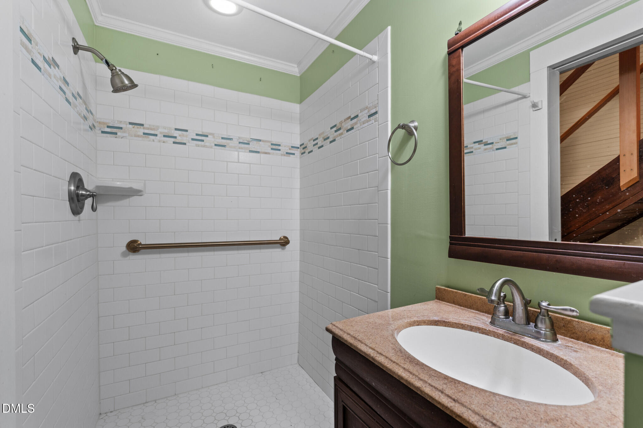 3415 Mt Willing Road Efland, NC 27243 - Photo 12 of 36 a bathroom with a sink and a mirror