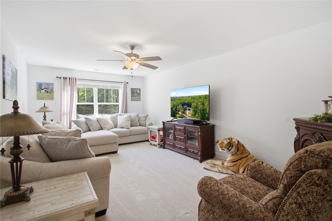 525 16th Circle Walhalla, SC 29691 - Photo 19 of 50 This living room provides a comfortable space for relaxation and gatherings.
