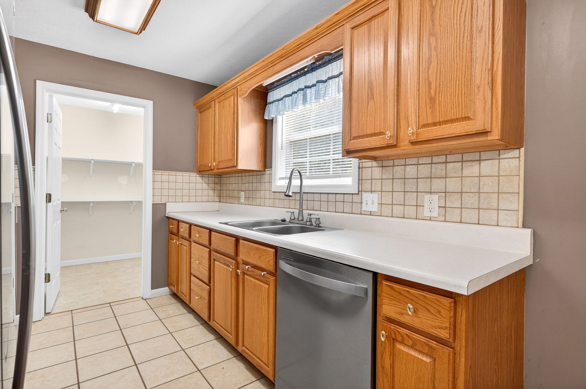 291 Poplar Point Lane Rickman, TN 38580 - Photo 6 of 41 a kitchen with stainless steel appliances a sink stove and cabinets