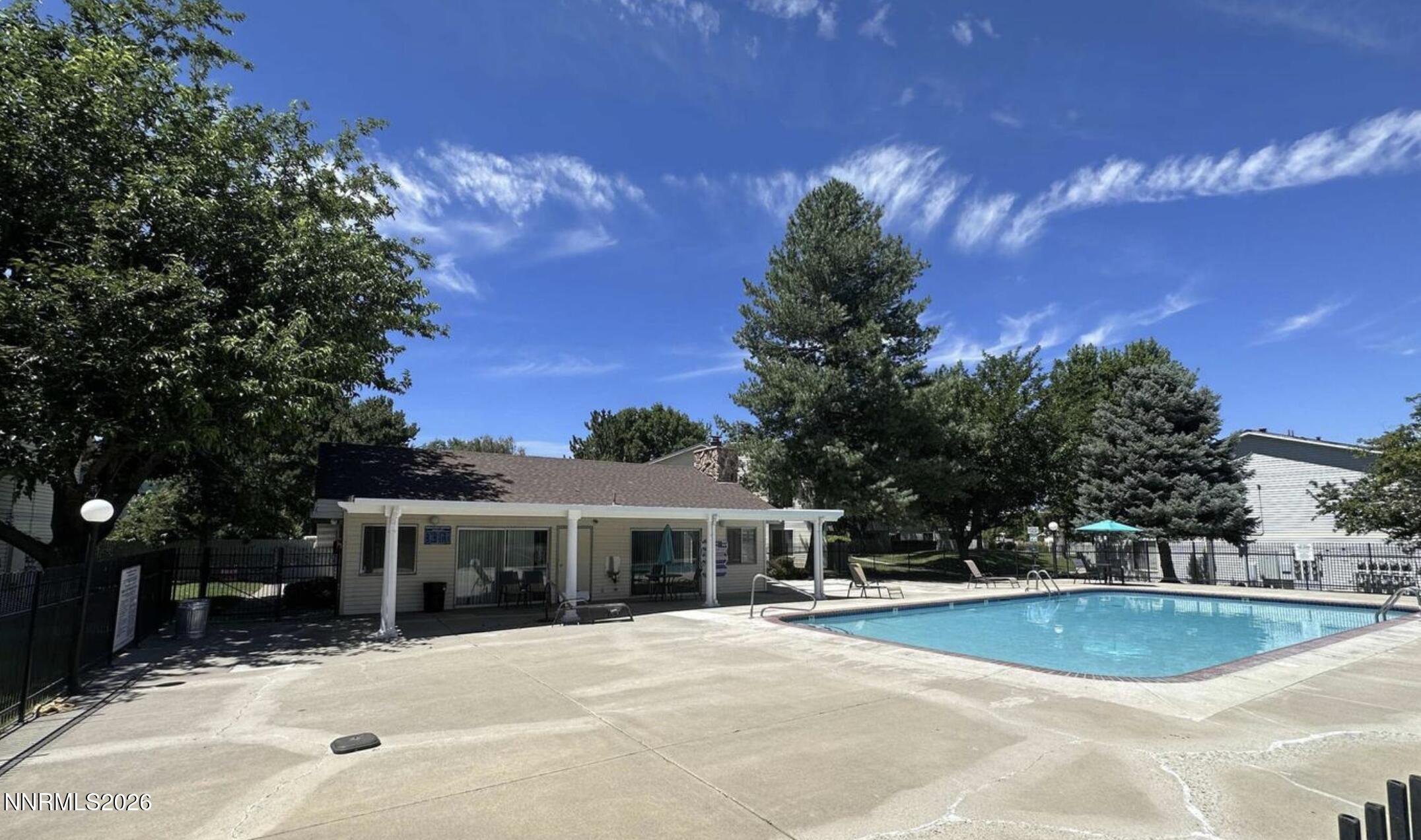 1557 Delucchi Lane, Unit G Reno, NV 89502 - Photo 8 of 8 a view of a house with a yard
