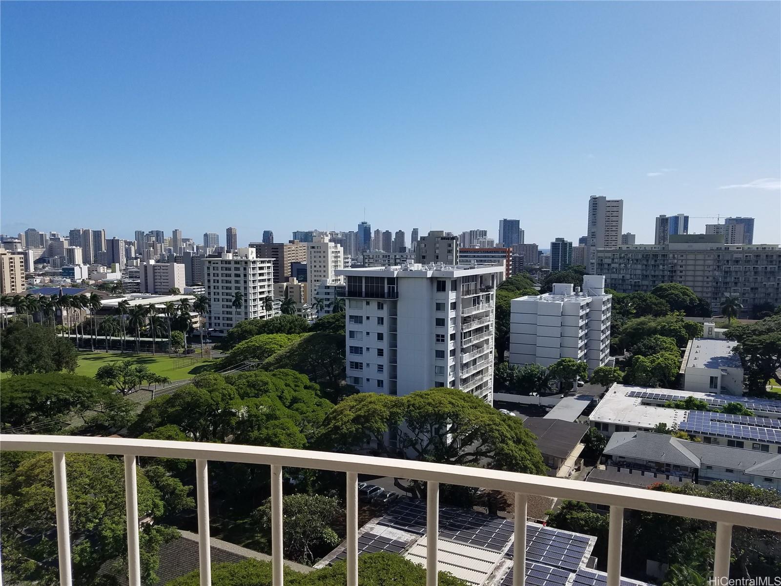 an aerial view of city with tall buildings