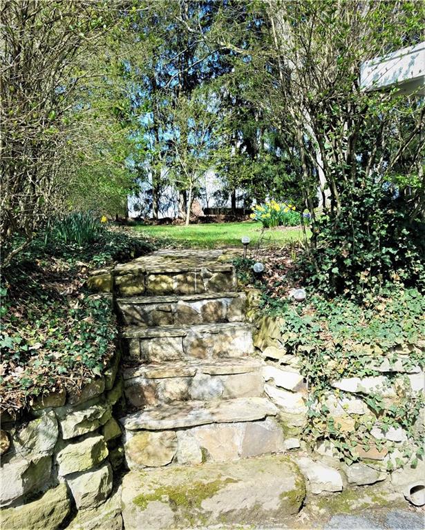 106 Artlee Avenue Butler, PA 16001 - Photo 22 of 24 Gorgeous stone steps lead to the beautiful private flat backyard.
