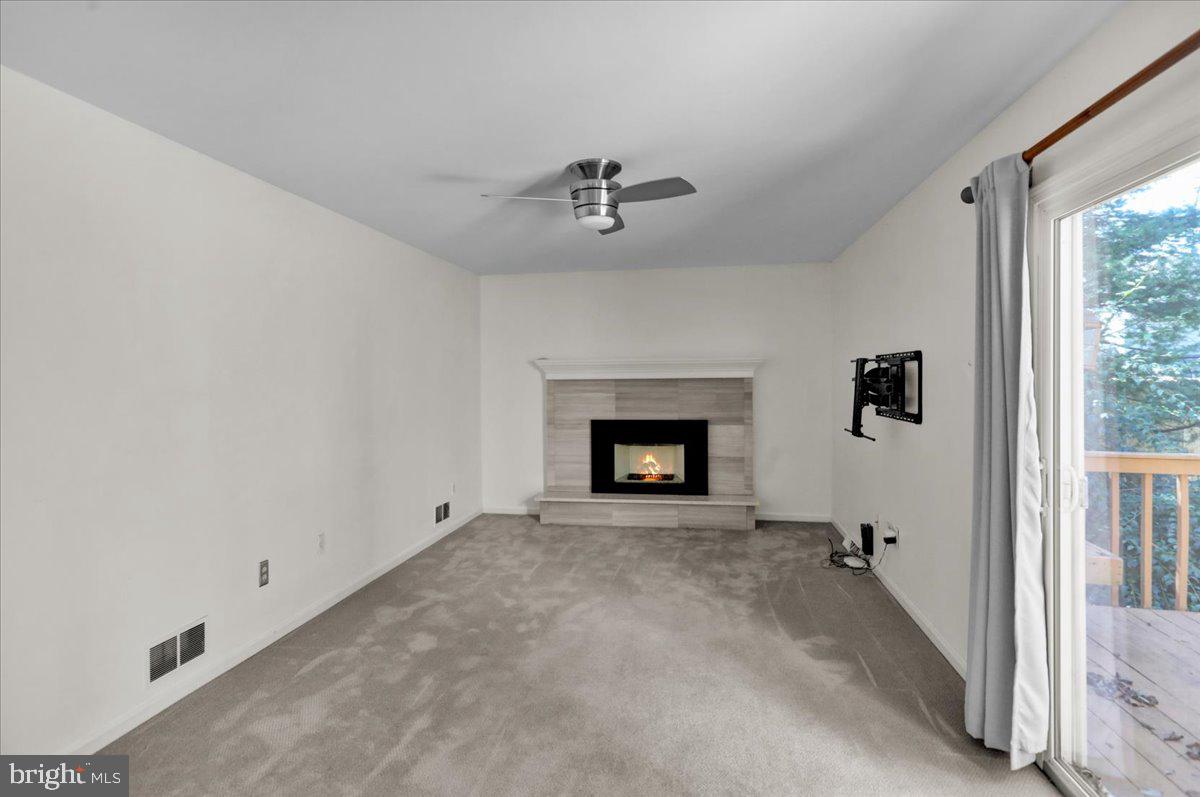 802 Apple Drive Reading, PA 19610 - Photo 25 of 47 a view of an empty room and a fireplace