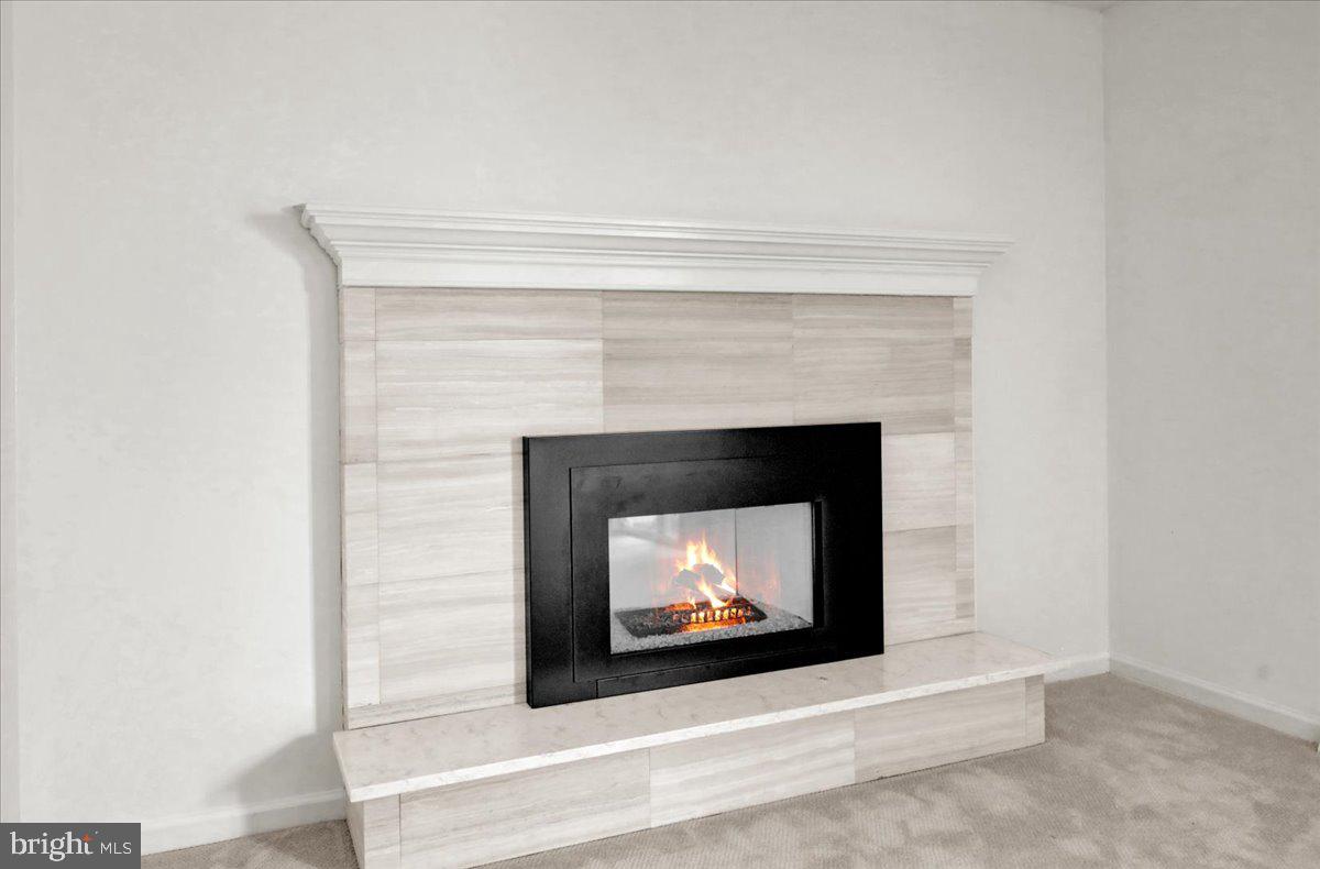 802 Apple Drive Reading, PA 19610 - Photo 27 of 47 a living room with a fireplace