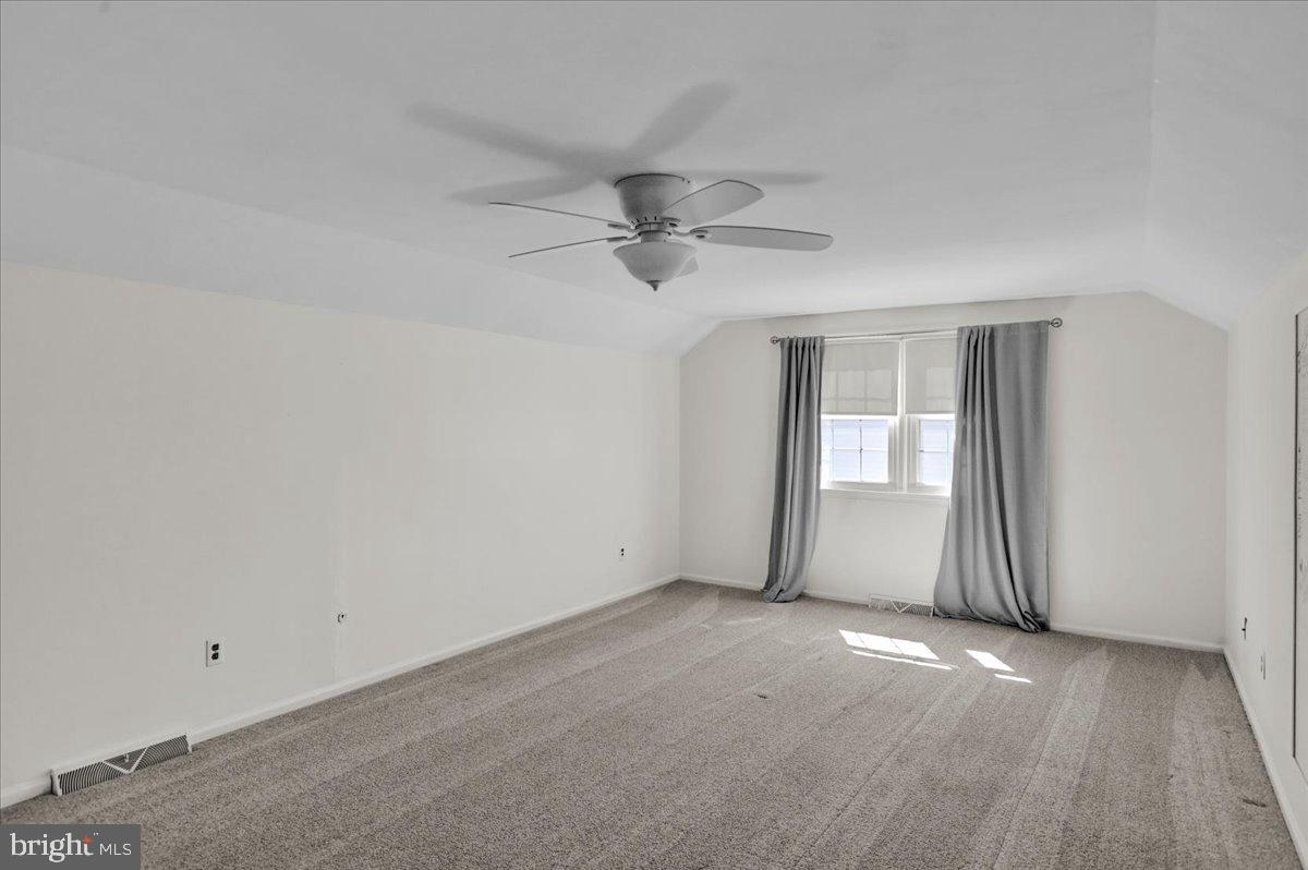 802 Apple Drive Reading, PA 19610 - Photo 31 of 47 a view of a livingroom with a ceiling fan and window