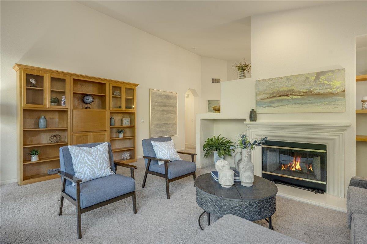 201 Augusta Lane Aptos, CA 95003 - Photo 11 of 36 a living room with furniture and a fireplace