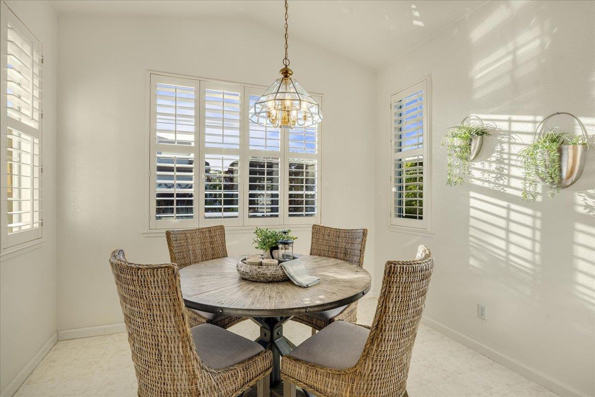 201 Augusta Lane Aptos, CA 95003 - Photo 7 of 36 a dining room with furniture window and outside view