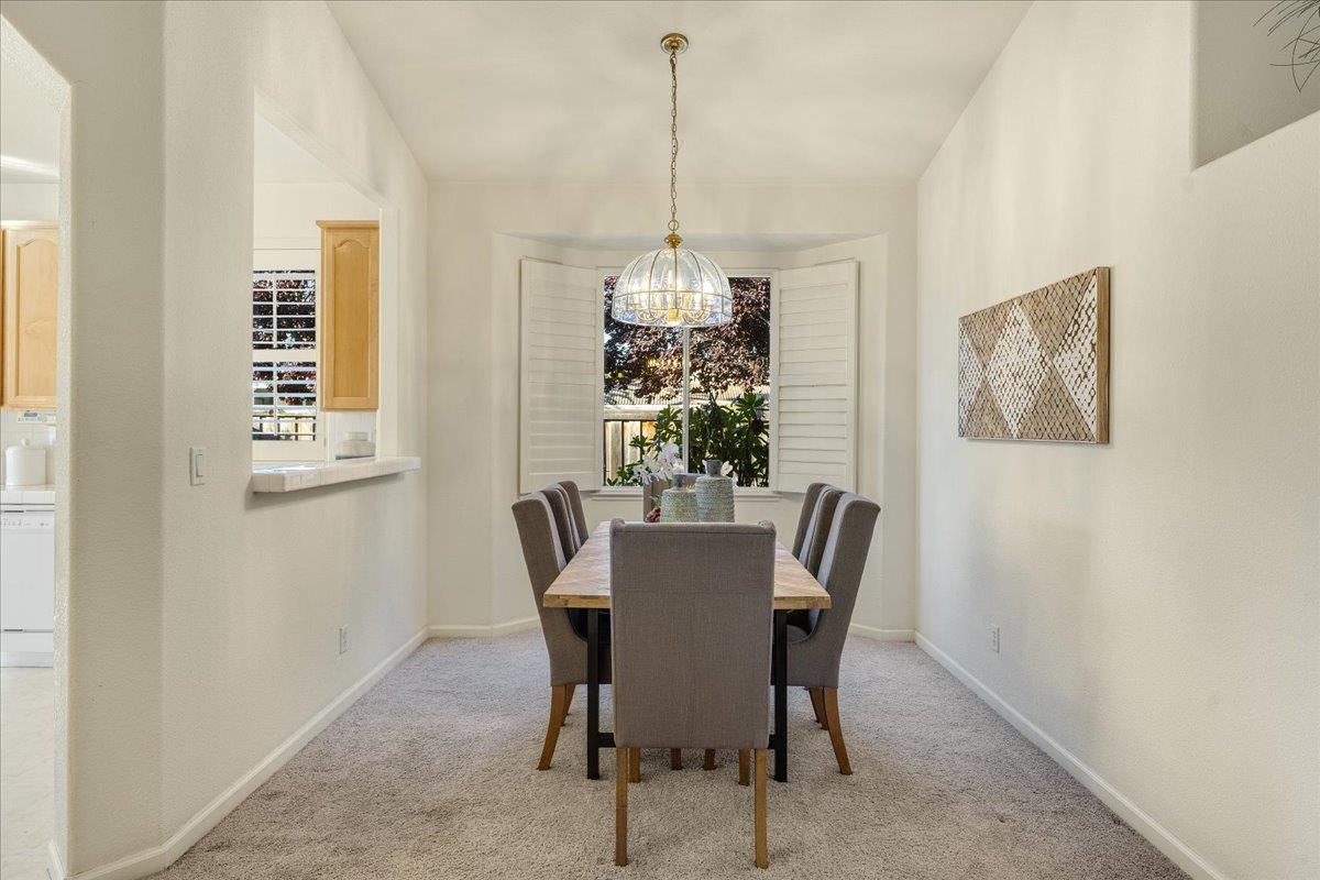 201 Augusta Lane Aptos, CA 95003 - Photo 9 of 36 a view of a dining room with furniture window and outside view