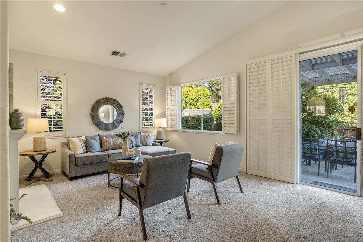 201 Augusta Lane Aptos, CA 95003 - Photo 10 of 36 a living room with furniture and a window
