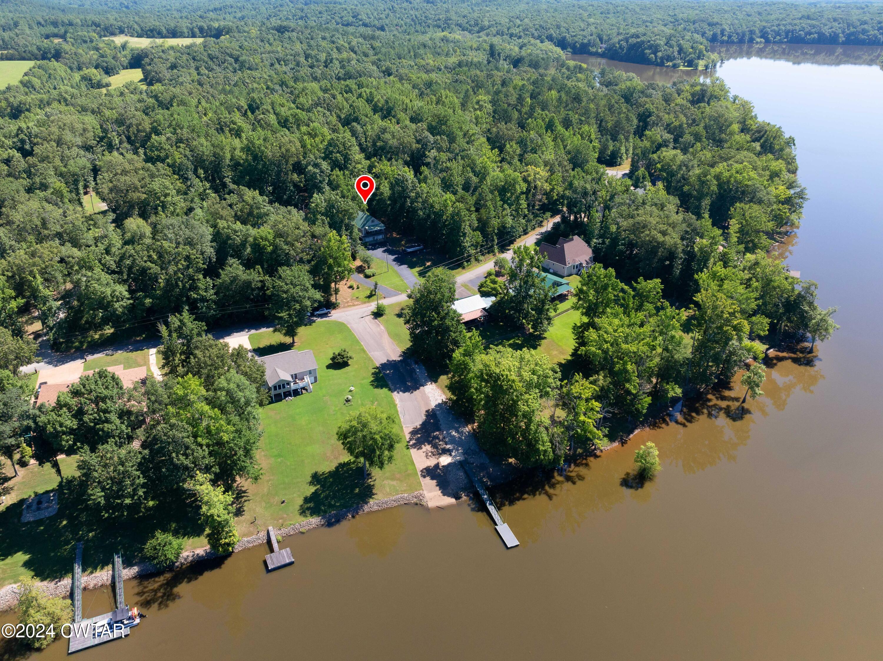 292 Featherfoot Pkwy Loop Parsons, TN 38363 - Photo 1 of 39 DJI_20240702101708_0026_D-Edit