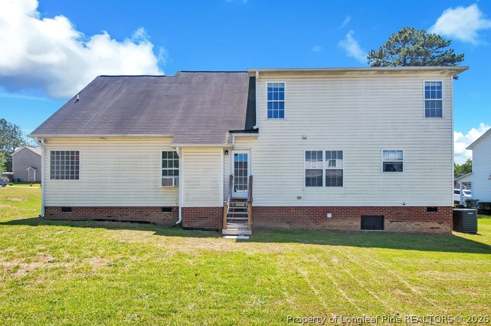 10 Pender Road Spring Lake, NC 28390 - Photo 29 of 35 a view of a house with a backyard