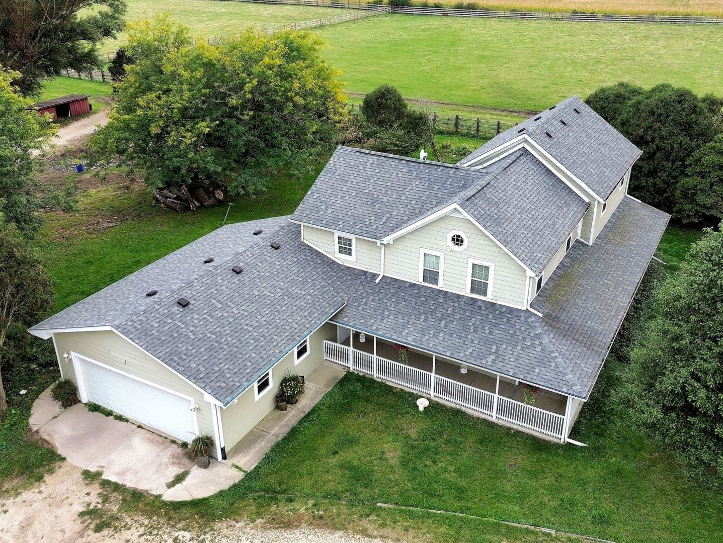 16989 East Ritchie Road Rochelle, IL 61068 - Photo 1 of 81 a view of a house with a yard and a garden