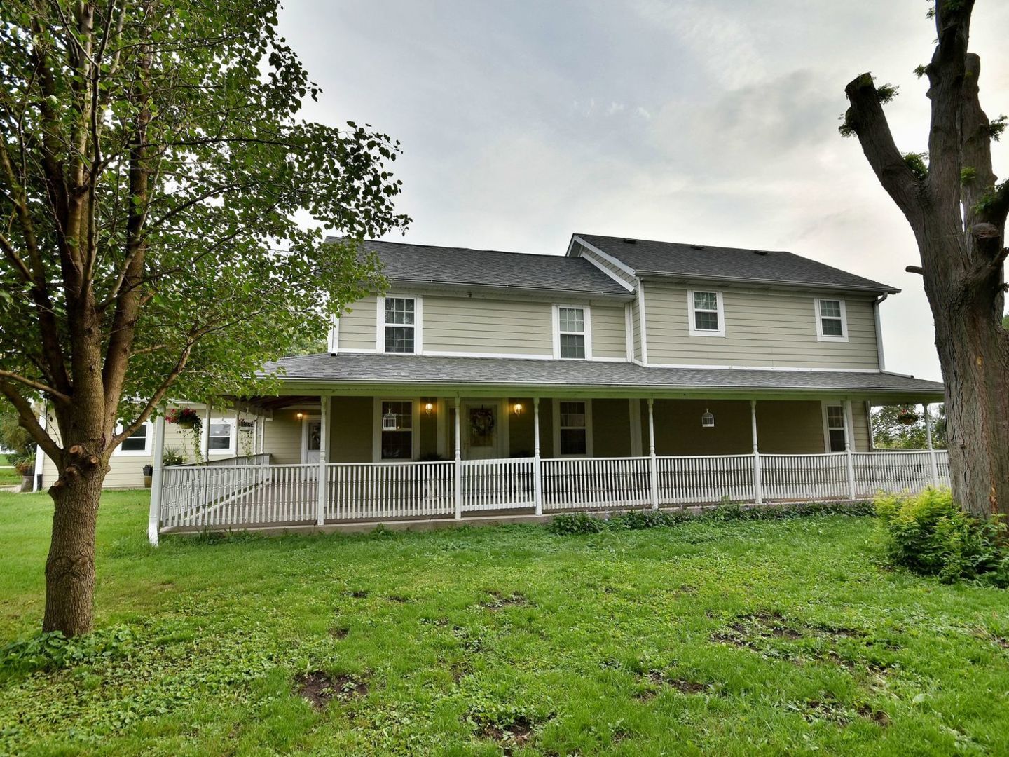 16989 East Ritchie Road Rochelle, IL 61068 - Photo 2 of 81 front view of a house with a yard