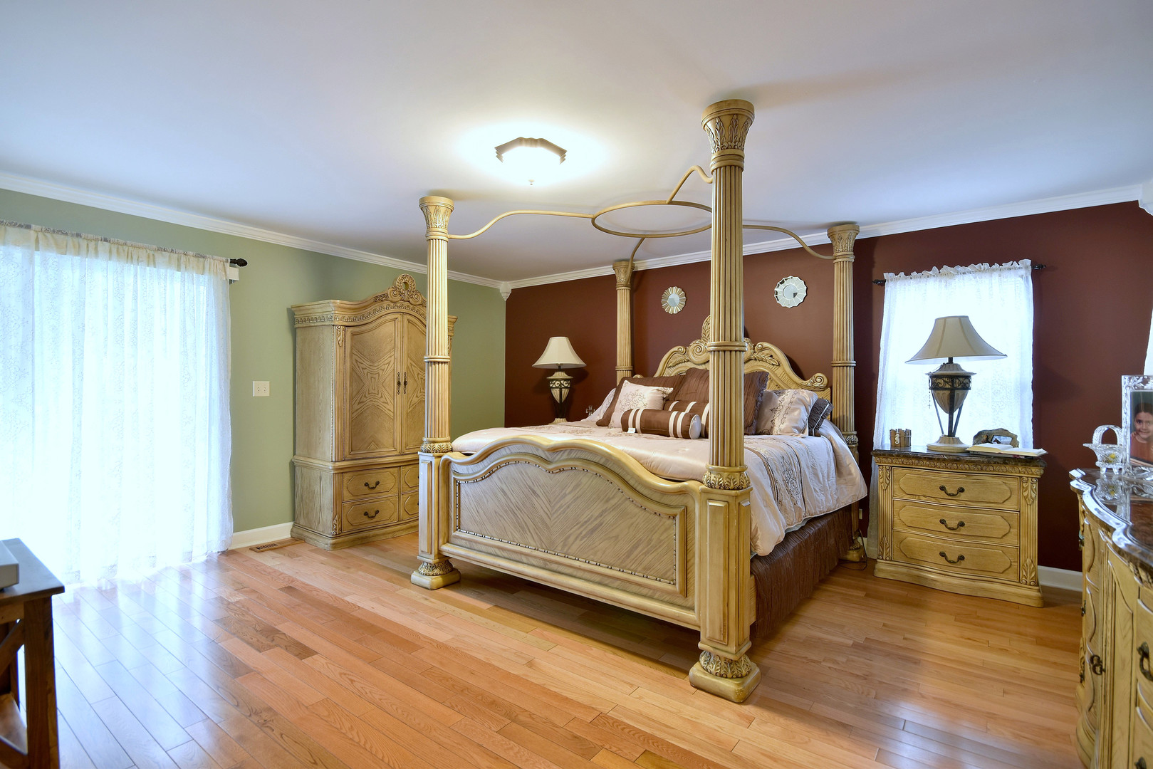 16989 East Ritchie Road Rochelle, IL 61068 - Photo 23 of 81 a bedroom with bed and wooden floor